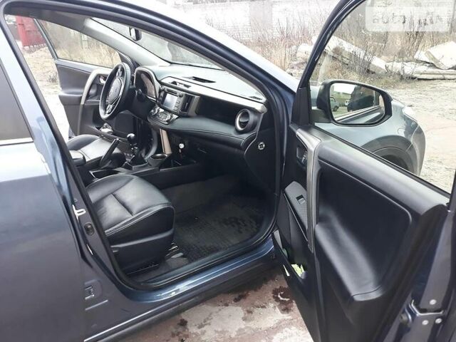 Синій Тойота РАВ 4, об'ємом двигуна 2 л та пробігом 253 тис. км за 16500 $, фото 24 на Automoto.ua
