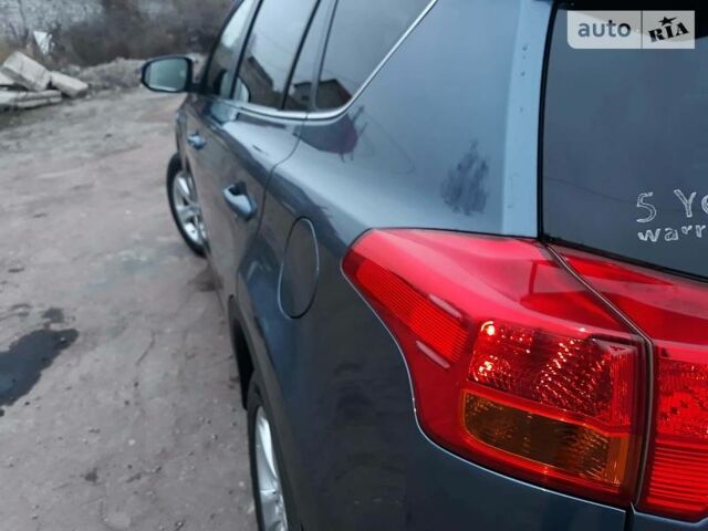 Синій Тойота РАВ 4, об'ємом двигуна 2 л та пробігом 253 тис. км за 16500 $, фото 40 на Automoto.ua