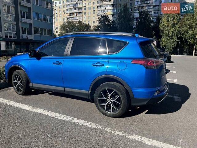 Синій Тойота РАВ 4, об'ємом двигуна 2.49 л та пробігом 106 тис. км за 24900 $, фото 2 на Automoto.ua