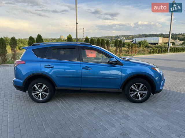 Синій Тойота РАВ 4, об'ємом двигуна 2.49 л та пробігом 77 тис. км за 18600 $, фото 1 на Automoto.ua
