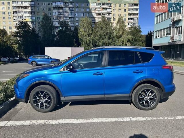 Синій Тойота РАВ 4, об'ємом двигуна 2.49 л та пробігом 106 тис. км за 24900 $, фото 4 на Automoto.ua