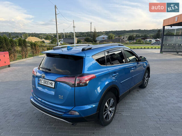 Синій Тойота РАВ 4, об'ємом двигуна 2.49 л та пробігом 77 тис. км за 18600 $, фото 3 на Automoto.ua