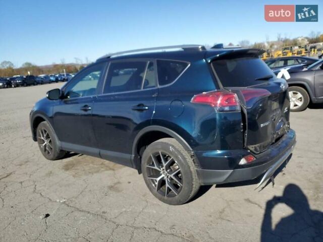 Синій Тойота РАВ 4, об'ємом двигуна 2.5 л та пробігом 58 тис. км за 6000 $, фото 1 на Automoto.ua