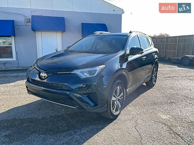 Синий Тойота РАВ 4, объемом двигателя 2.49 л и пробегом 138 тыс. км за 5000 $, фото 1 на Automoto.ua