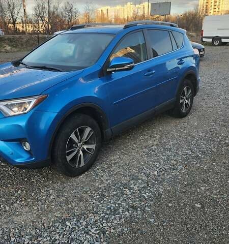 Синий Тойота РАВ 4, объемом двигателя 2.49 л и пробегом 124 тыс. км за 19500 $, фото 1 на Automoto.ua