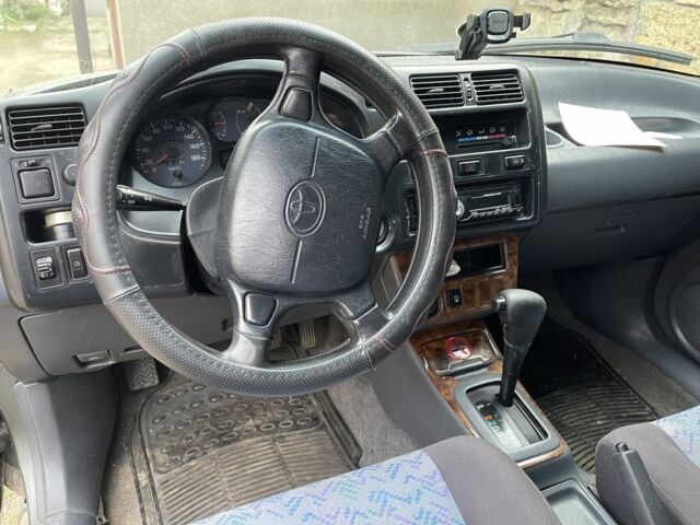 Зелений Тойота РАВ 4, об'ємом двигуна 2 л та пробігом 100 тис. км за 4500 $, фото 5 на Automoto.ua