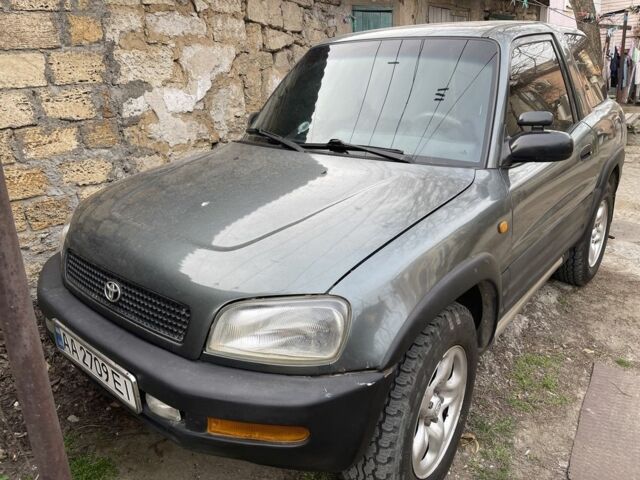 Зелений Тойота РАВ 4, об'ємом двигуна 2 л та пробігом 100 тис. км за 4500 $, фото 12 на Automoto.ua