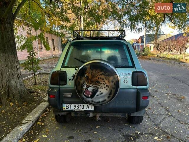Зеленый Тойота РАВ 4, объемом двигателя 2 л и пробегом 400 тыс. км за 4900 $, фото 2 на Automoto.ua