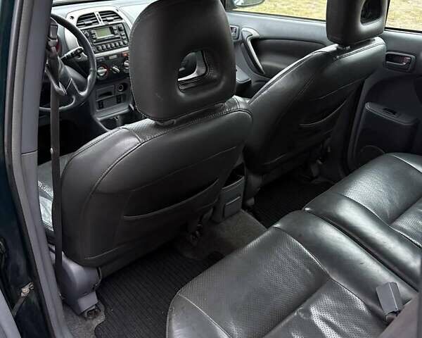 Зеленый Тойота РАВ 4, объемом двигателя 2 л и пробегом 355 тыс. км за 6200 $, фото 4 на Automoto.ua