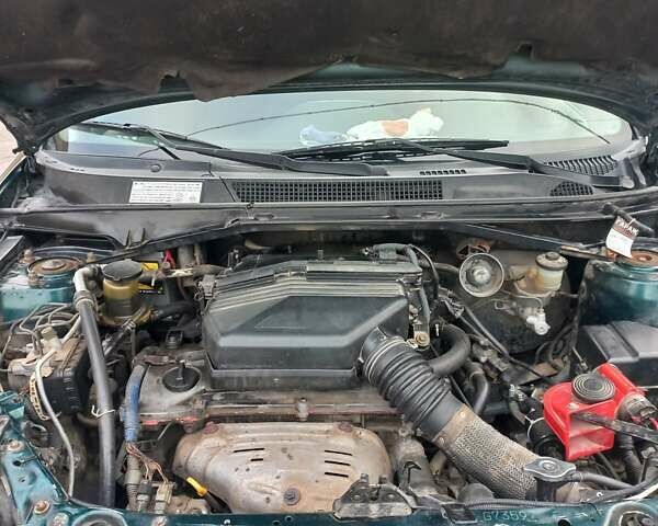 Зеленый Тойота РАВ 4, объемом двигателя 2 л и пробегом 219 тыс. км за 6800 $, фото 3 на Automoto.ua