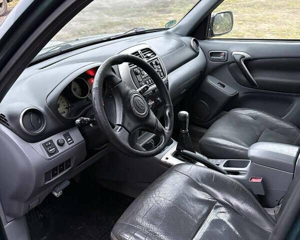 Зеленый Тойота РАВ 4, объемом двигателя 2 л и пробегом 355 тыс. км за 6200 $, фото 6 на Automoto.ua