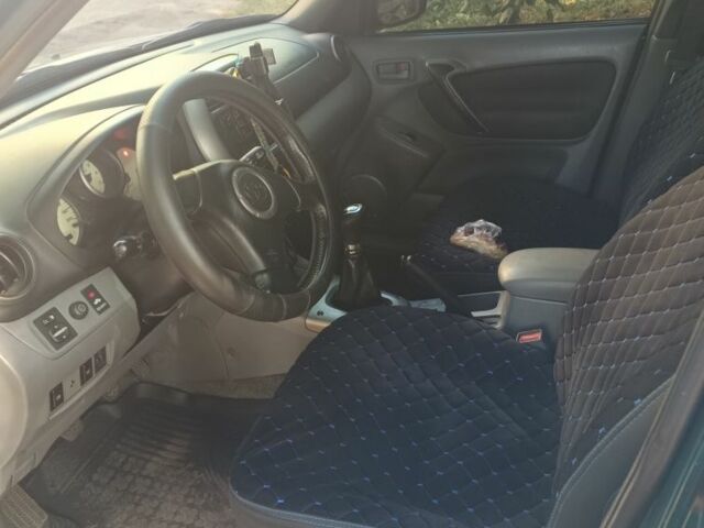 Зеленый Тойота РАВ 4, объемом двигателя 2 л и пробегом 260 тыс. км за 3500 $, фото 2 на Automoto.ua