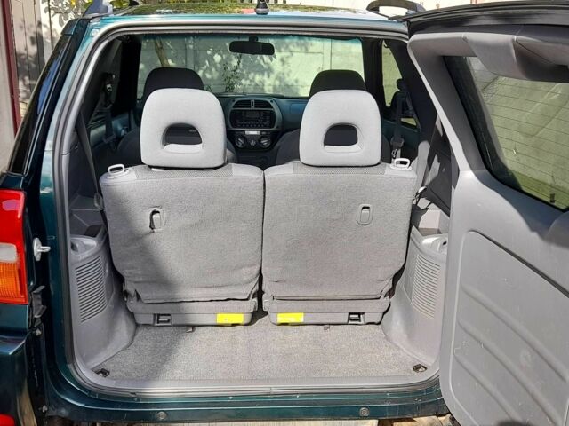 Зелений Тойота РАВ 4, об'ємом двигуна 2 л та пробігом 182 тис. км за 6900 $, фото 3 на Automoto.ua