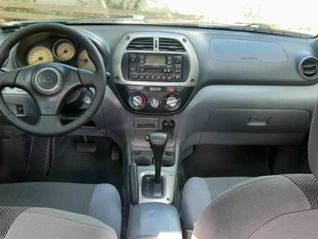 Зелений Тойота РАВ 4, об'ємом двигуна 2 л та пробігом 182 тис. км за 6900 $, фото 4 на Automoto.ua