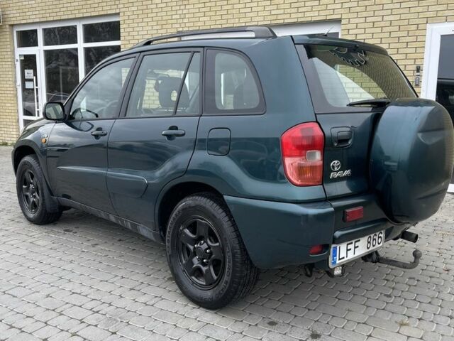 Зеленый Тойота РАВ 4, объемом двигателя 2 л и пробегом 350 тыс. км за 3900 $, фото 3 на Automoto.ua