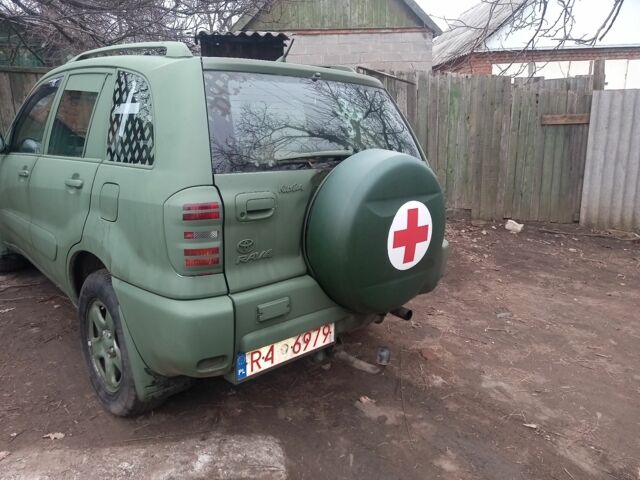 Зеленый Тойота РАВ 4, объемом двигателя 2 л и пробегом 230 тыс. км за 4528 $, фото 3 на Automoto.ua