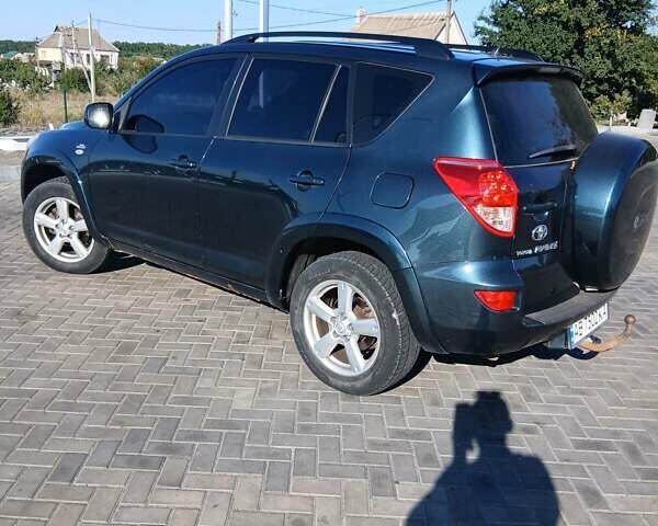 Зеленый Тойота РАВ 4, объемом двигателя 2.23 л и пробегом 314 тыс. км за 7100 $, фото 3 на Automoto.ua