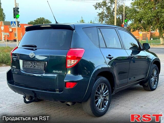 Зелений Тойота РАВ 4, об'ємом двигуна 2.2 л та пробігом 184 тис. км за 9300 $, фото 4 на Automoto.ua