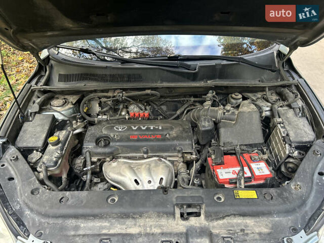 Зелений Тойота РАВ 4, об'ємом двигуна 2 л та пробігом 304 тис. км за 8300 $, фото 30 на Automoto.ua