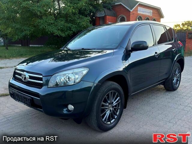 Зелений Тойота РАВ 4, об'ємом двигуна 2.2 л та пробігом 184 тис. км за 9300 $, фото 1 на Automoto.ua