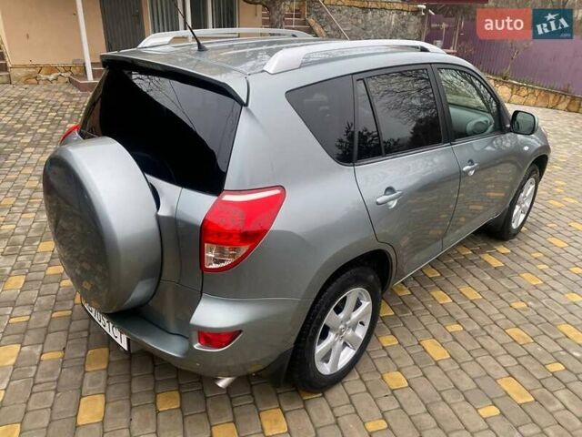 Зелений Тойота РАВ 4, об'ємом двигуна 2 л та пробігом 179 тис. км за 9750 $, фото 1 на Automoto.ua