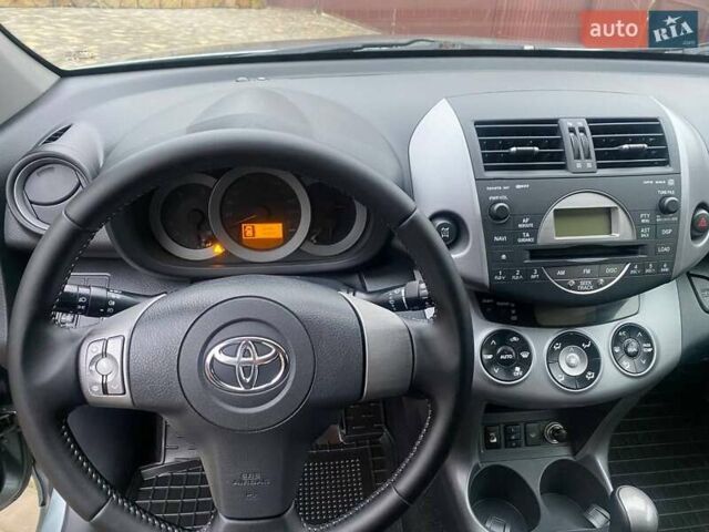 Зелений Тойота РАВ 4, об'ємом двигуна 2 л та пробігом 179 тис. км за 9750 $, фото 46 на Automoto.ua