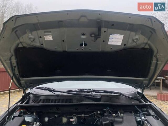 Зелений Тойота РАВ 4, об'ємом двигуна 2 л та пробігом 179 тис. км за 9750 $, фото 48 на Automoto.ua