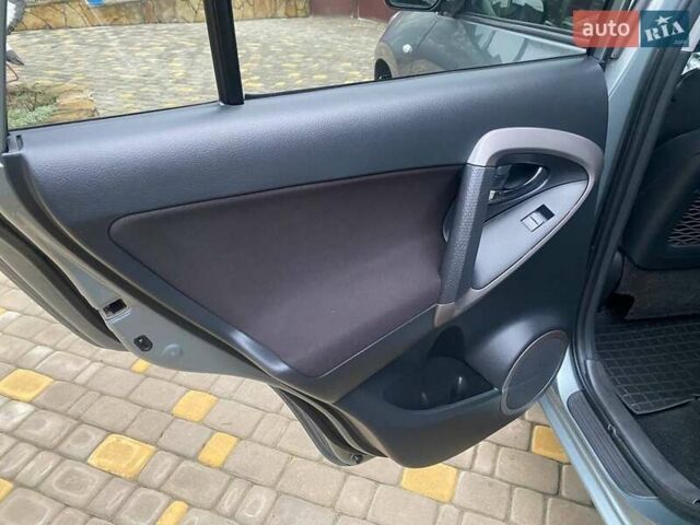 Зелений Тойота РАВ 4, об'ємом двигуна 2 л та пробігом 179 тис. км за 9750 $, фото 40 на Automoto.ua