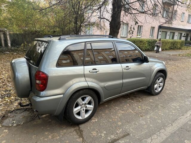 Зеленый Тойота РАВ 4, объемом двигателя 2 л и пробегом 390 тыс. км за 5800 $, фото 1 на Automoto.ua