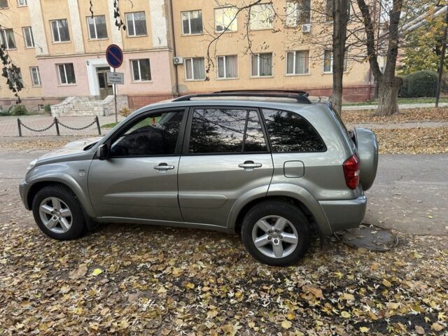 Зеленый Тойота РАВ 4, объемом двигателя 2 л и пробегом 390 тыс. км за 5800 $, фото 2 на Automoto.ua