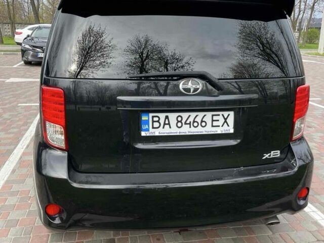 Черный Тойота Сцион, объемом двигателя 2.5 л и пробегом 230 тыс. км за 7000 $, фото 1 на Automoto.ua