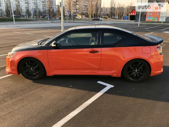 Оранжевый Тойота Сцион, объемом двигателя 2.5 л и пробегом 170 тыс. км за 8000 $, фото 2 на Automoto.ua