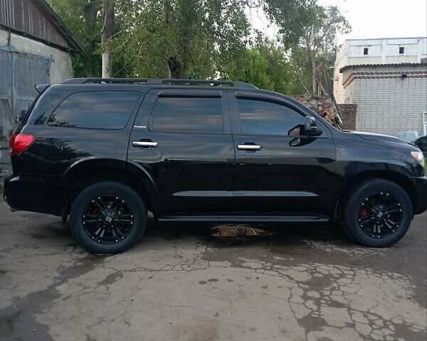 Черный Тойота Секвойя, объемом двигателя 5.7 л и пробегом 180 тыс. км за 20000 $, фото 1 на Automoto.ua