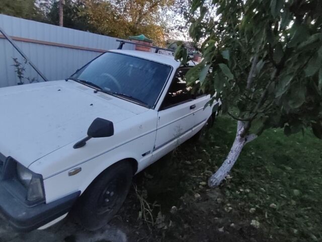 Белый Тойота Старлет, объемом двигателя 1 л и пробегом 209 тыс. км за 663 $, фото 2 на Automoto.ua