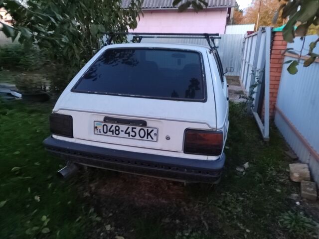 Белый Тойота Старлет, объемом двигателя 1 л и пробегом 209 тыс. км за 663 $, фото 4 на Automoto.ua