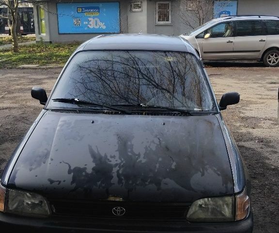 Серый Тойота Старлет, объемом двигателя 1 л и пробегом 201 тыс. км за 1600 $, фото 1 на Automoto.ua