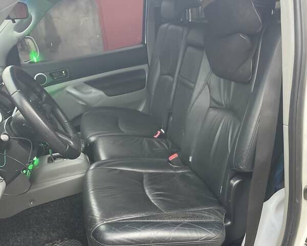 Белый Тойота Такома, объемом двигателя 2.7 л и пробегом 270 тыс. км за 9500 $, фото 11 на Automoto.ua