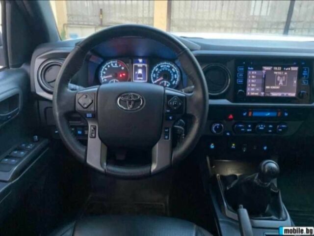 Белый Тойота Такома, объемом двигателя 2.7 л и пробегом 67 тыс. км за 14000 $, фото 8 на Automoto.ua