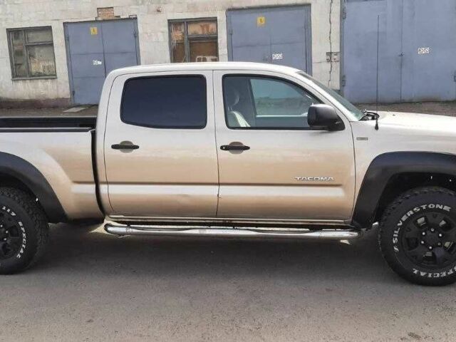 Бежевый Тойота Такома, объемом двигателя 4 л и пробегом 182 тыс. км за 11200 $, фото 1 на Automoto.ua