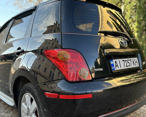 Черный Тойота ХА, объемом двигателя 1.5 л и пробегом 199 тыс. км за 5500 $, фото 4 на Automoto.ua