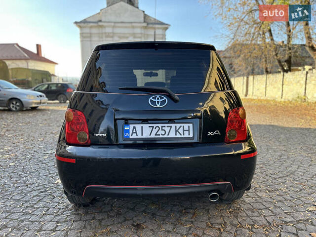 Черный Тойота ХА, объемом двигателя 1.5 л и пробегом 199 тыс. км за 5500 $, фото 5 на Automoto.ua