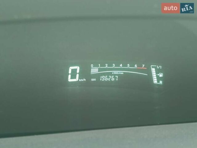 Белый Тойота Ярис, объемом двигателя 1 л и пробегом 196 тыс. км за 4800 $, фото 5 на Automoto.ua