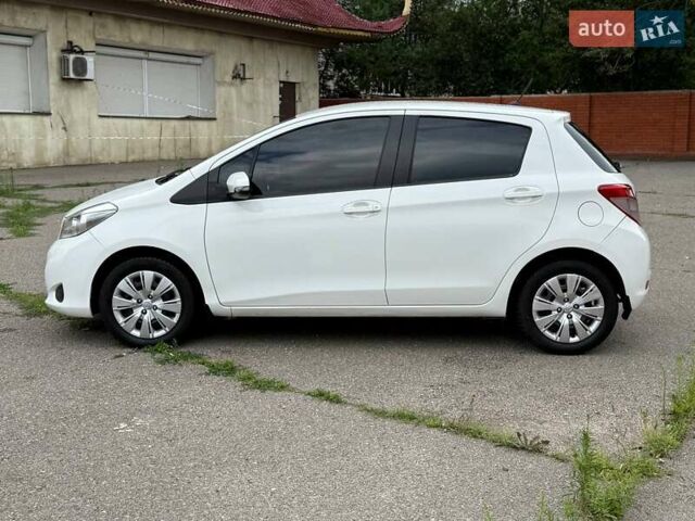 Білий Тойота Яріс, об'ємом двигуна 1.33 л та пробігом 115 тис. км за 8350 $, фото 4 на Automoto.ua