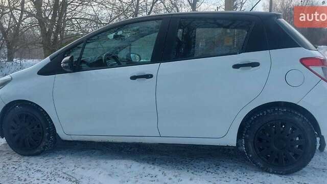 Белый Тойота Ярис, объемом двигателя 1.33 л и пробегом 130 тыс. км за 6700 $, фото 8 на Automoto.ua