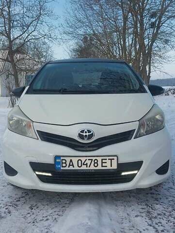 Белый Тойота Ярис, объемом двигателя 1.33 л и пробегом 130 тыс. км за 6700 $, фото 1 на Automoto.ua