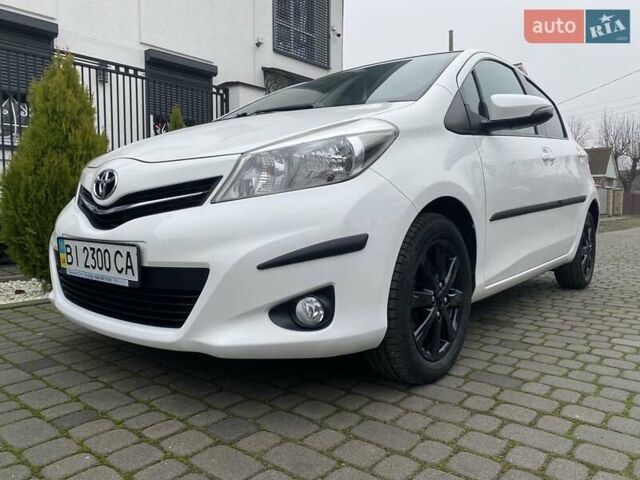 Білий Тойота Яріс, об'ємом двигуна 1.33 л та пробігом 64 тис. км за 13500 $, фото 1 на Automoto.ua