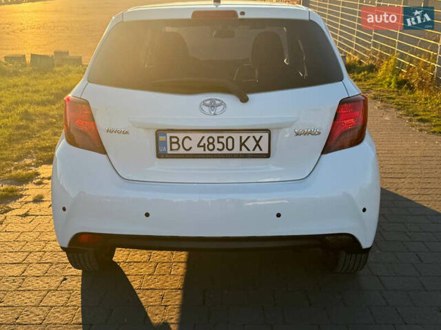Білий Тойота Яріс, об'ємом двигуна 1.33 л та пробігом 75 тис. км за 11300 $, фото 8 на Automoto.ua