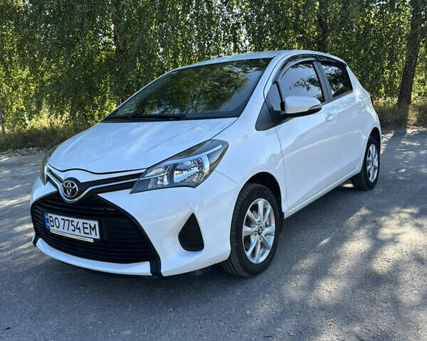 Белый Тойота Ярис, объемом двигателя 1 л и пробегом 68 тыс. км за 9200 $, фото 28 на Automoto.ua