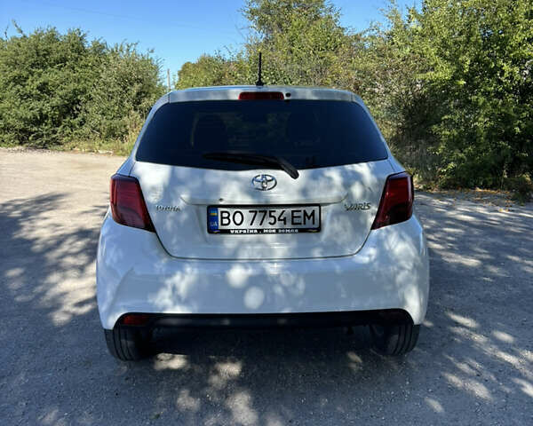 Белый Тойота Ярис, объемом двигателя 1 л и пробегом 68 тыс. км за 9200 $, фото 25 на Automoto.ua