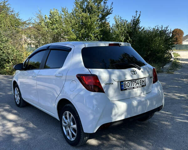 Белый Тойота Ярис, объемом двигателя 1 л и пробегом 68 тыс. км за 9200 $, фото 26 на Automoto.ua